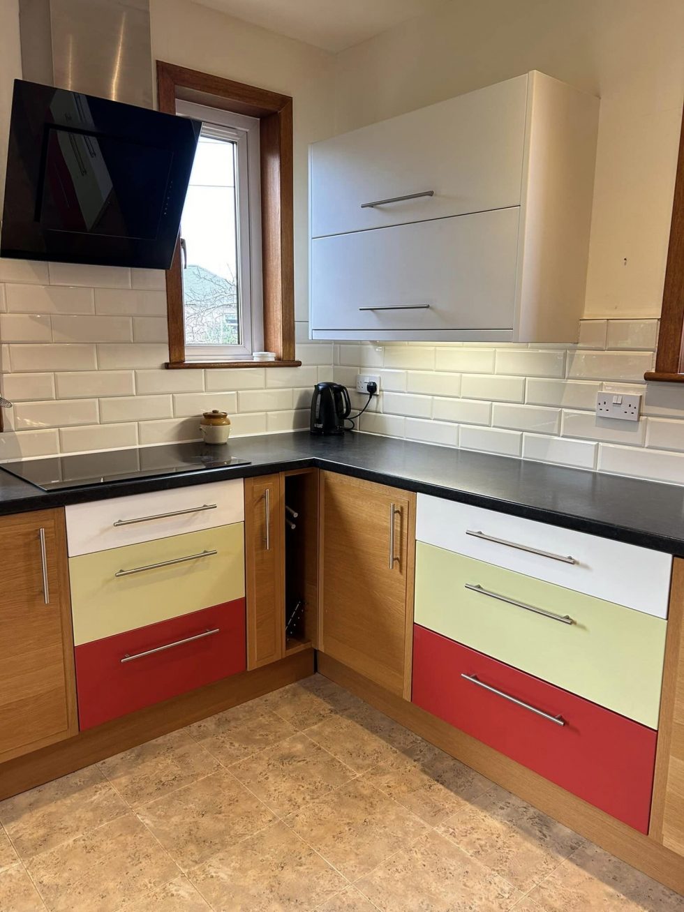 Hand painted kitchen with units in white, cream and red